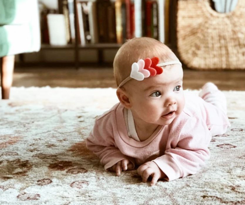 baby girl with valentine day heart headband